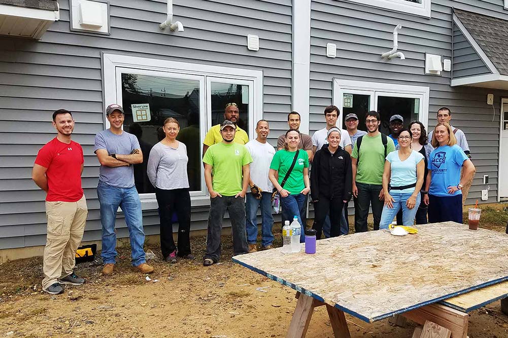 Billtrust employees at a volunteer home building event